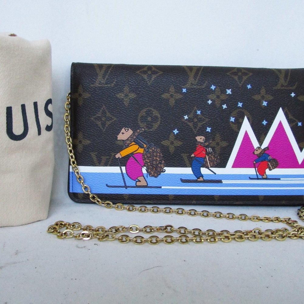 100% AUTHENTIC LOUIS VUITTON LTD EDITION ANIMATION POCHETTE WEEKEND CLUTCH